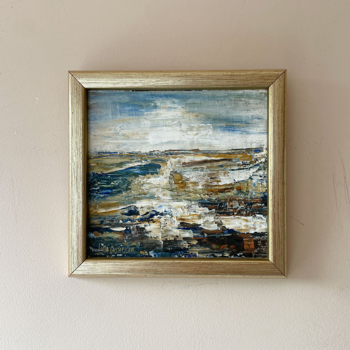 	Semi-abstract coastal oil painting worked in thick palette knife texture, low horizon and luminous sky, in a silvered wood frame