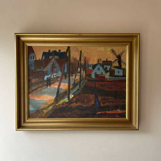 Original mid century oil painting of a village lane with a windmill at dusk, in warm russet and peach tones, in a gold frame. Free UK delivery.