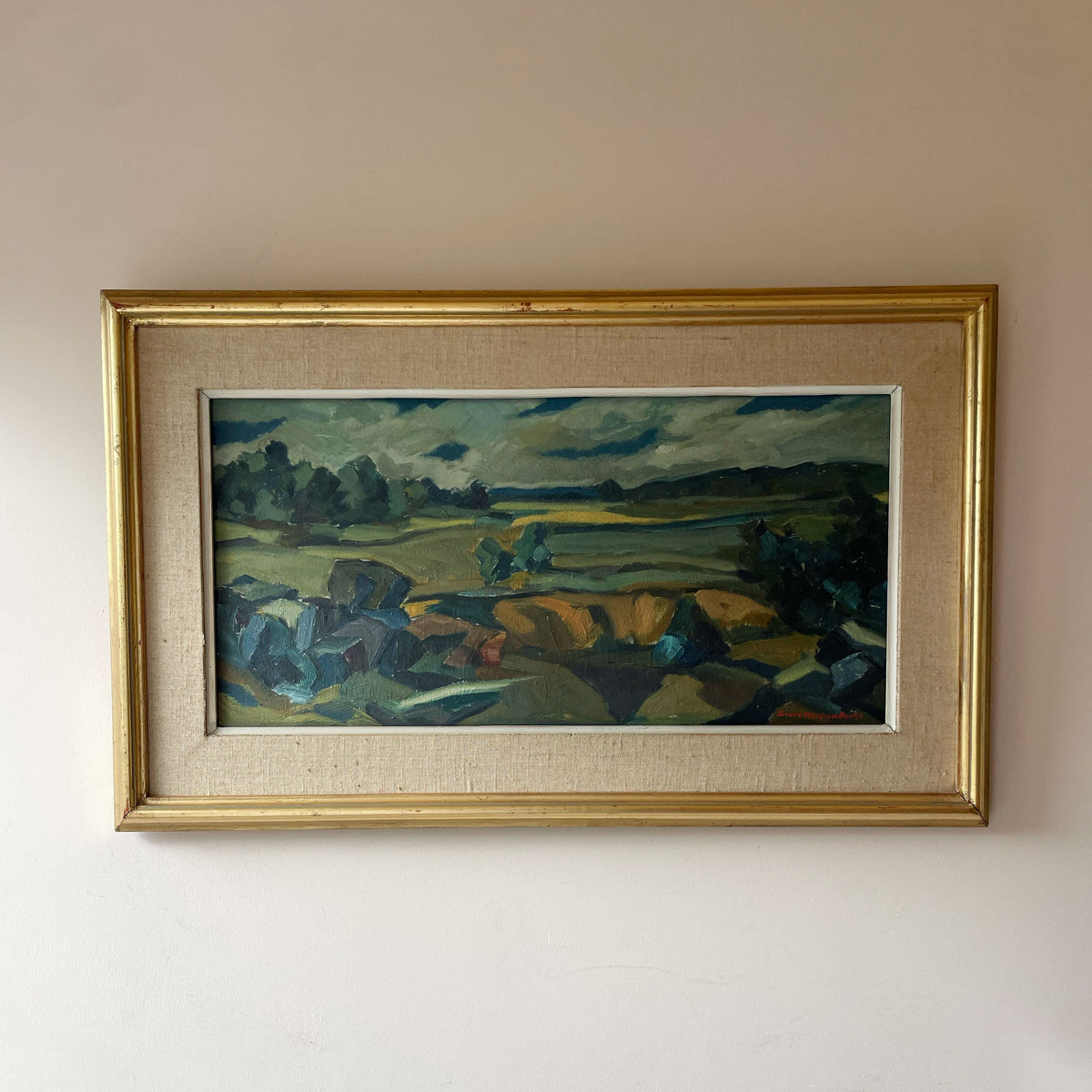 Original mid century Scandinavian oil painting of fields and boulders under a moody sky, in a linen and gilt frame. One-of-a-kind. Free UK delivery.