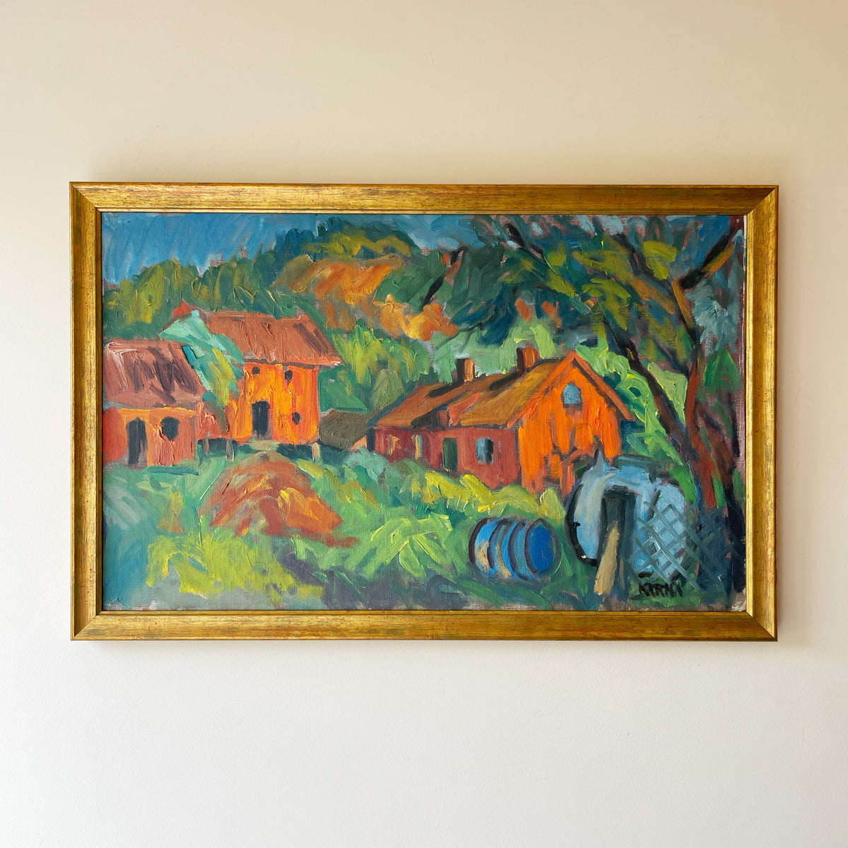 Vintage Swedish oil painting of red houses in lush summer greenery with bold brushwork, in gold frame